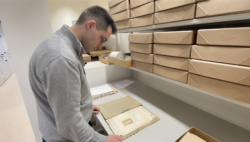 Matthew Hurst looking at the papers of Jeremy Bray.