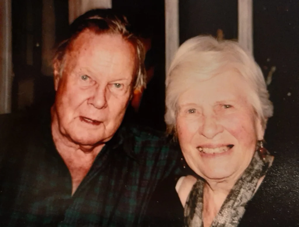 Ruth and Corelli Barnett pictured together smiling at the camera