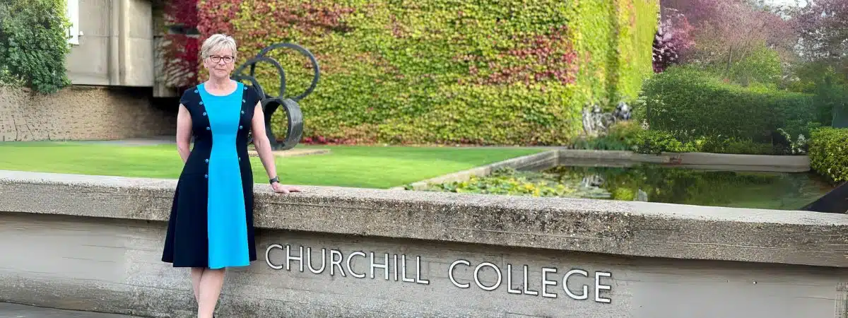 Sharon Peacock stands at the front of College.